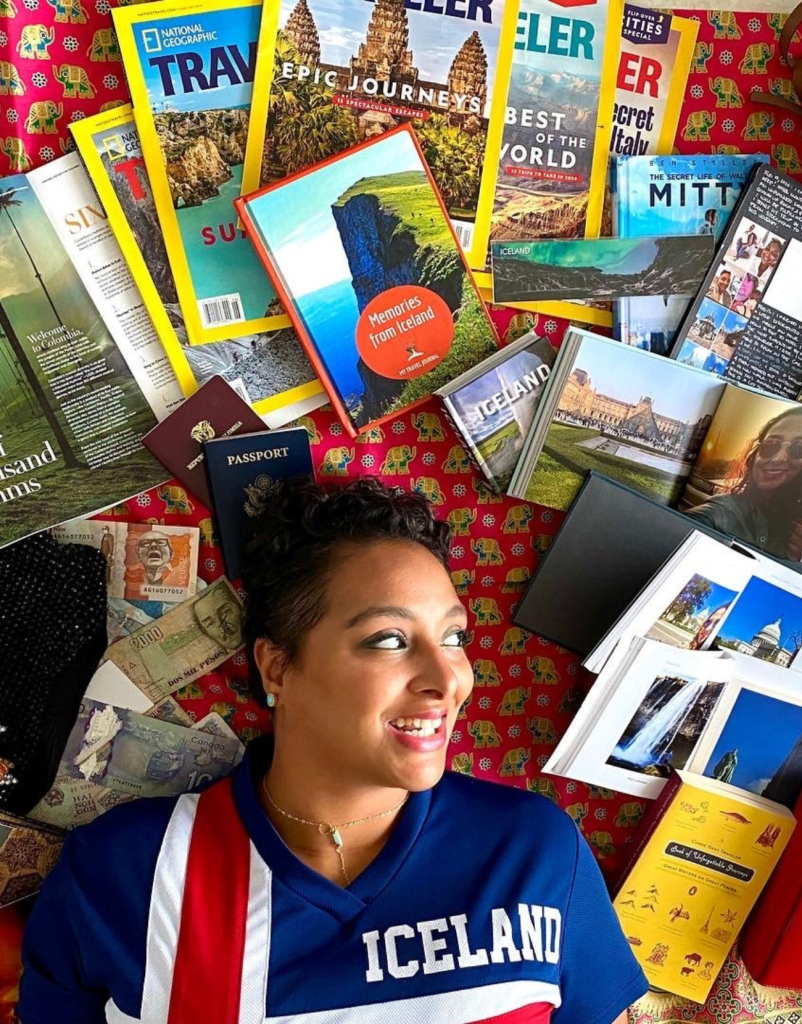 Woman in an Iceland Soccer Jersey with all of her memories surrounding her