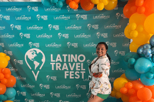 Latina Blogger and Content Creator - Maribel at the Latino Travel Fest step and repeat.