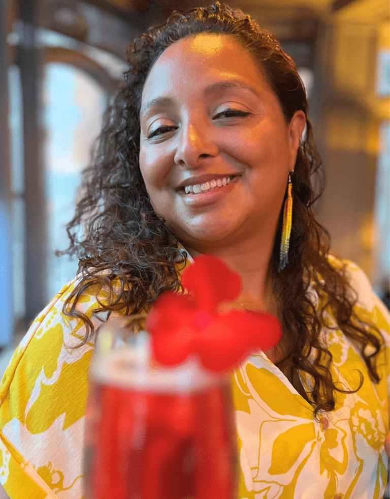 Solo female traveler enjoying a cocktail at Bistro Le Sam inside Fairmont Le Château Frontenac, Quebec City